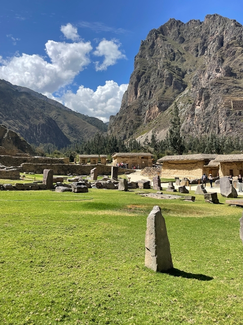 Ancient ruins with mountains in the background in Ollantaytambo.