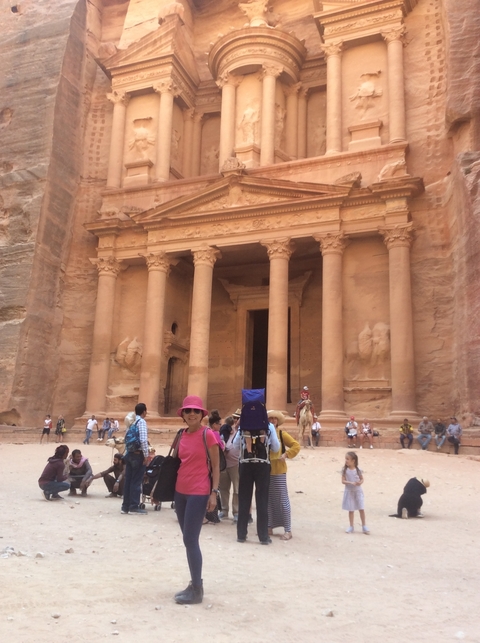 Tourists visiting the iconic Petra Treasury.
