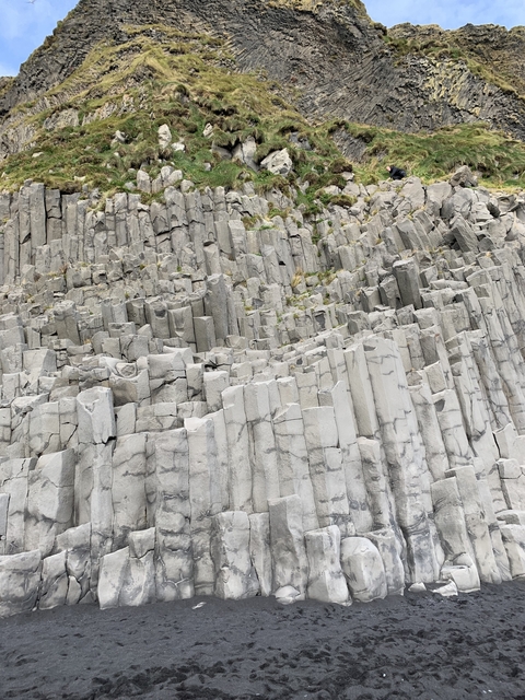 Close-up of basalt columns in a natural formation.