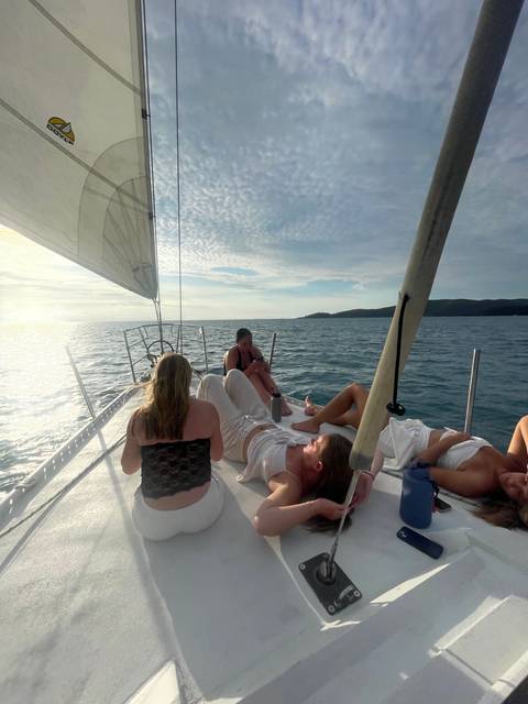 People relaxing on a boat.