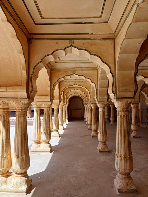       Architectural arches with carved decorations.
  