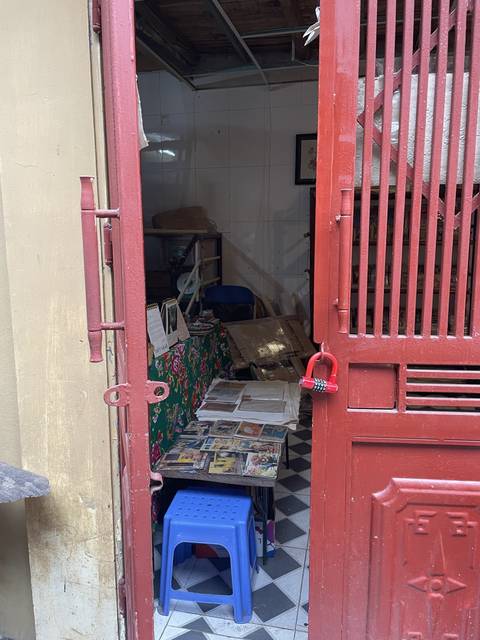 Interior view of a shop with various items on display.