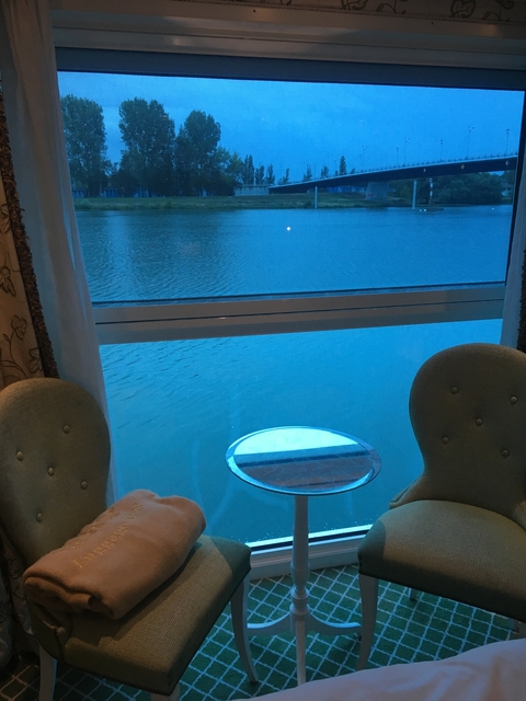 View of the water from a window in a boat.
