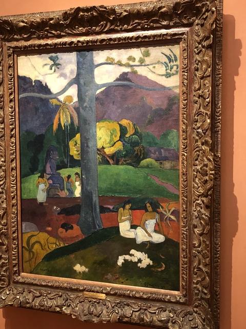       Framed painting with figures in a museum.
  