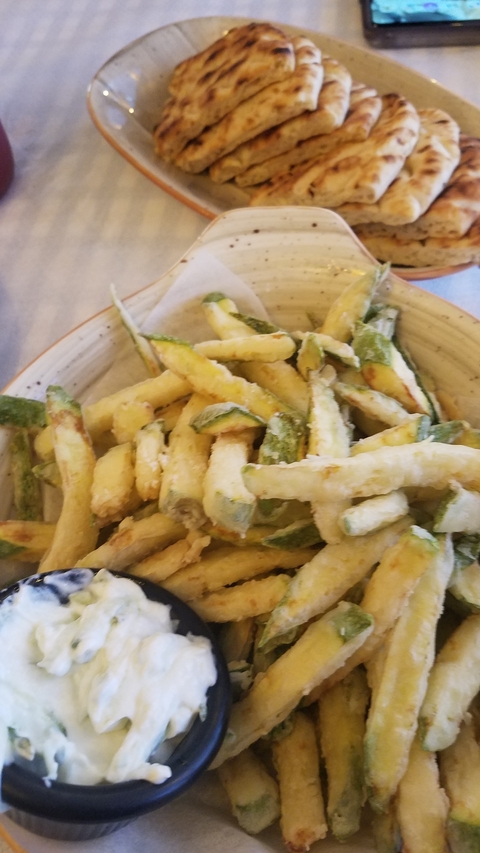       Plate of fried vegetable sticks.
  
