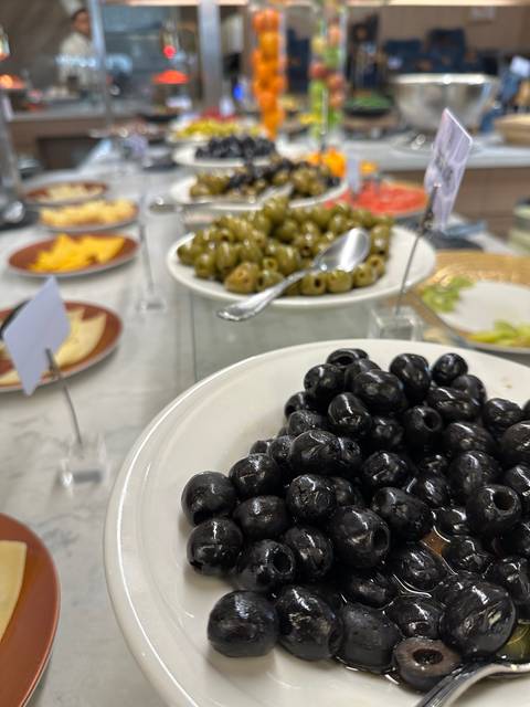       Variety of olives on a buffet table.
  
