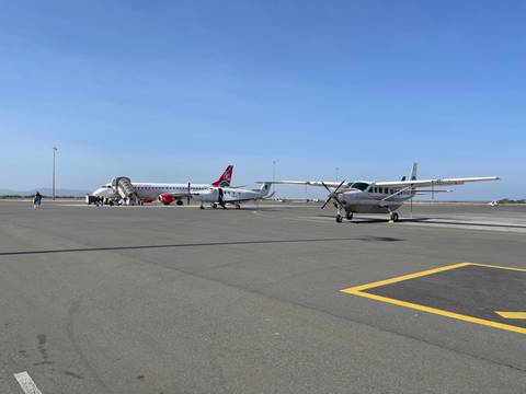 Airplanes parked on the tarmac.