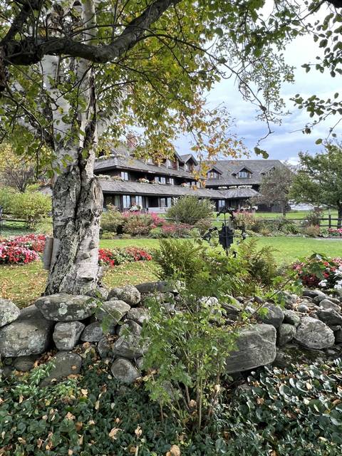       Scenic view of a building with gardens.
  