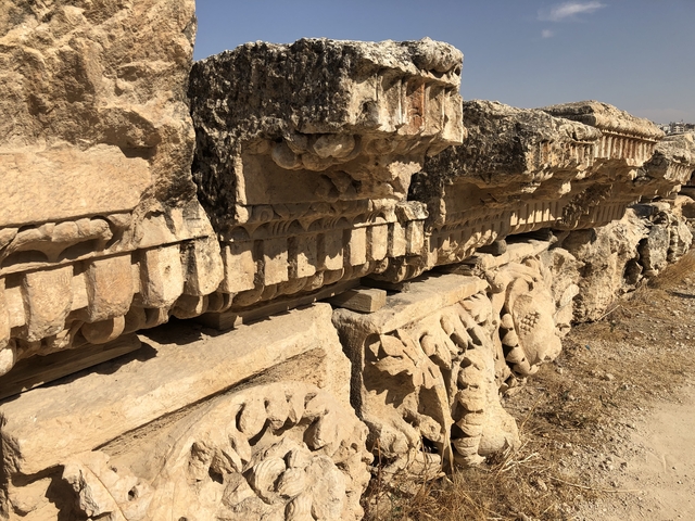Close-up of ancient stone carvings with ornate designs.