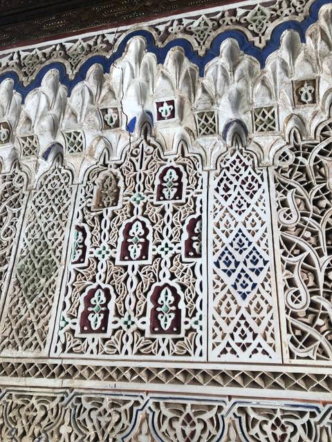       Detailed architectural carvings.
  