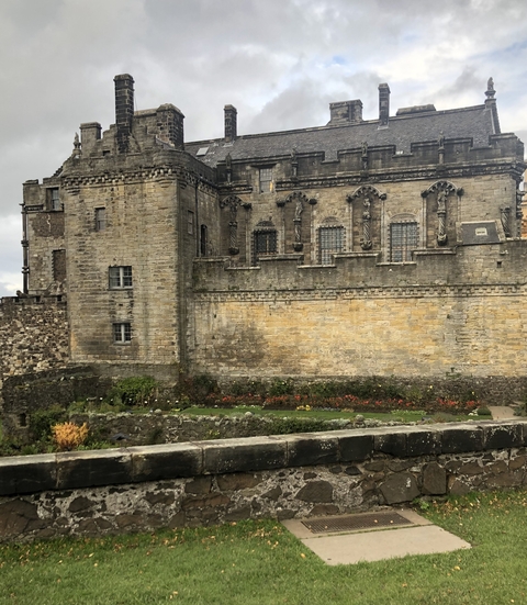       Historic stone building with intricate architecture.
  