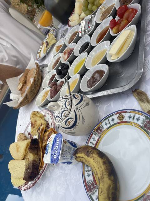 A table set with a variety of breakfast items.