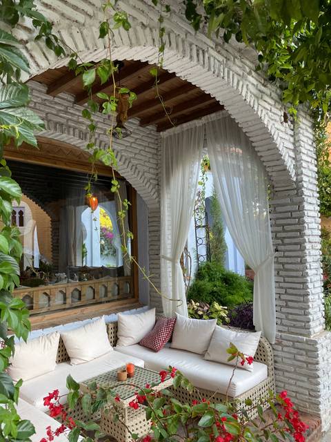 Charming architectural interior with white and green accents.