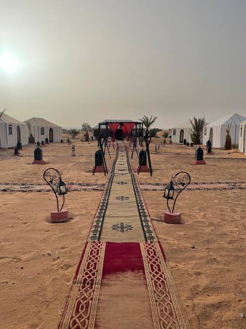 Desert camp setup with traditional decor.