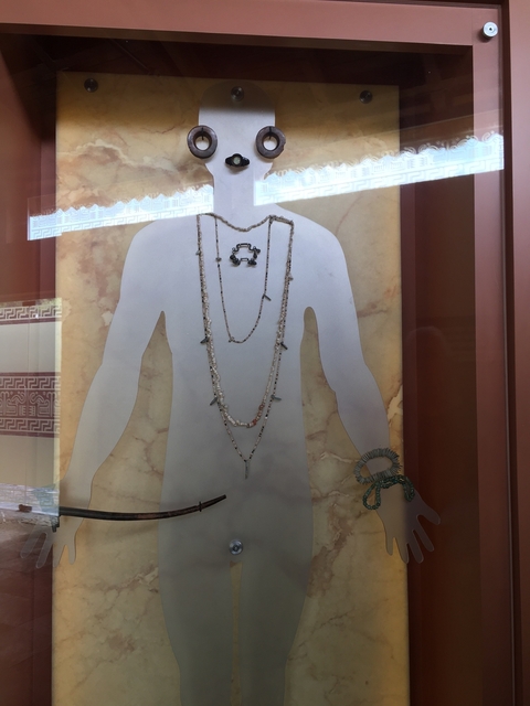       Exhibit of historical jewelry on display.
  