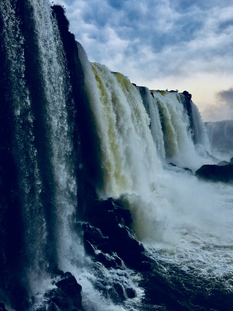 Close-up of water cascading down Iguazu Falls.