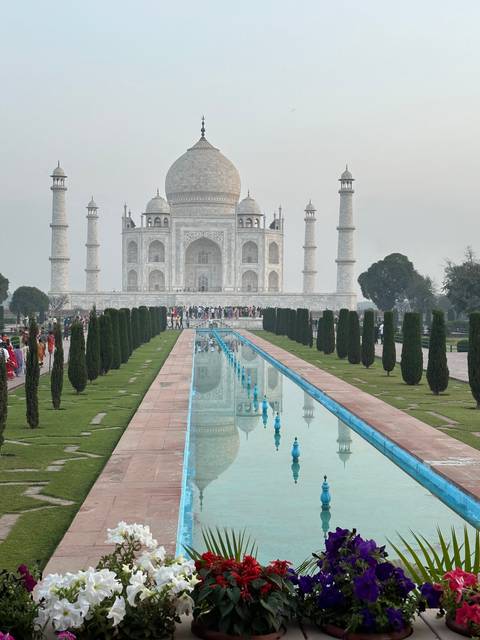       Taj Mahal with a reflecting pool in front.
  