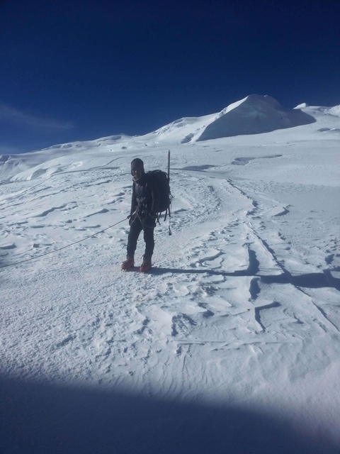 Person on a snowy mountain expedition.