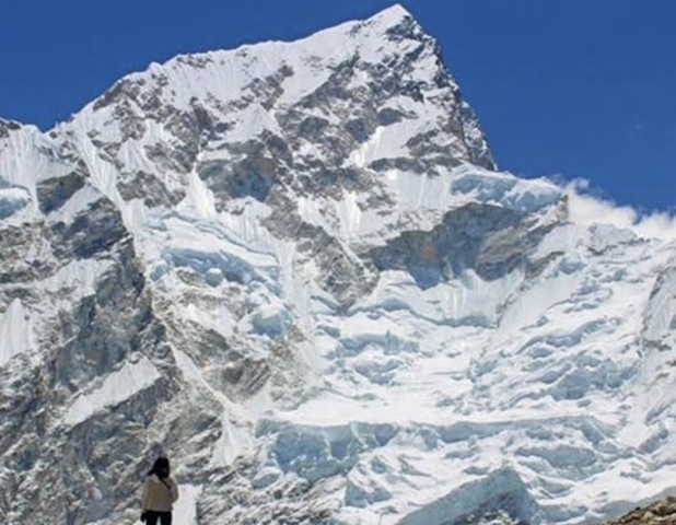 Close-up of a snow-capped mountain peak.