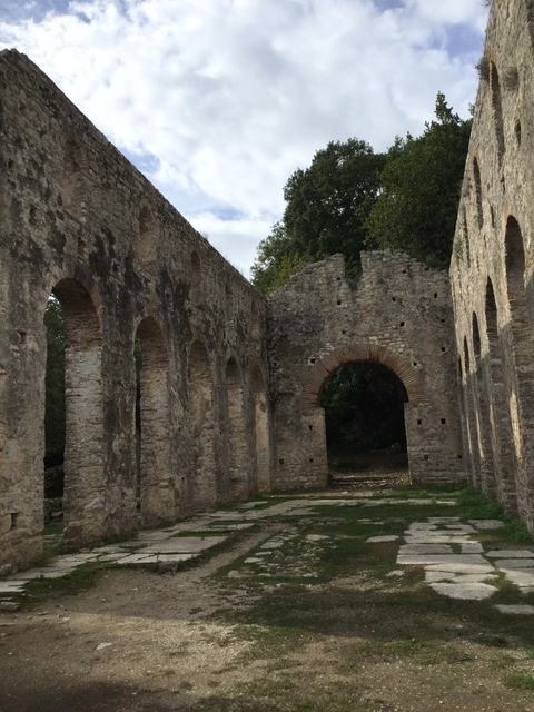 Ancient stone ruins with arched passageways.