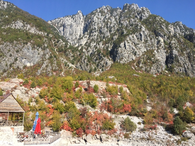 Mountainous landscape with autumn foliage.