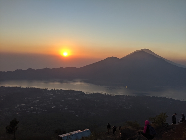 Sunset view over mountains and lake