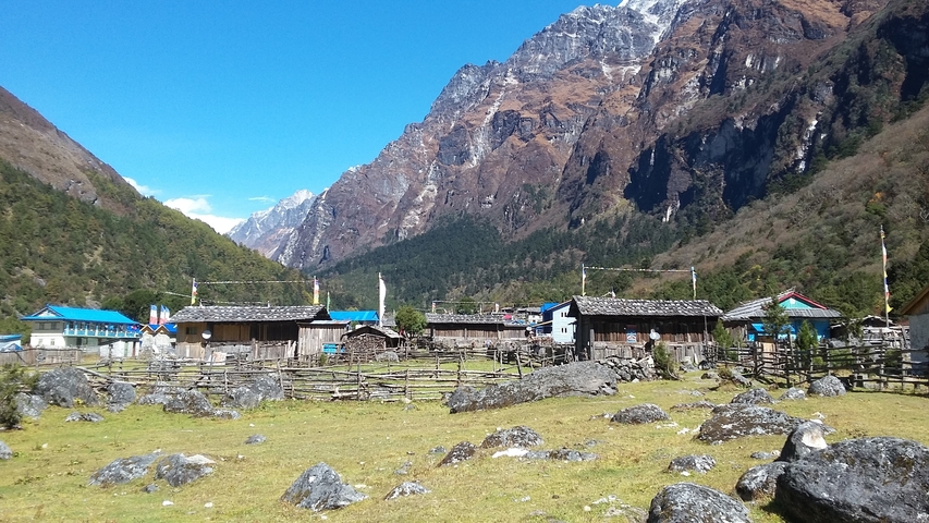 Mountain village with traditional wooden houses.