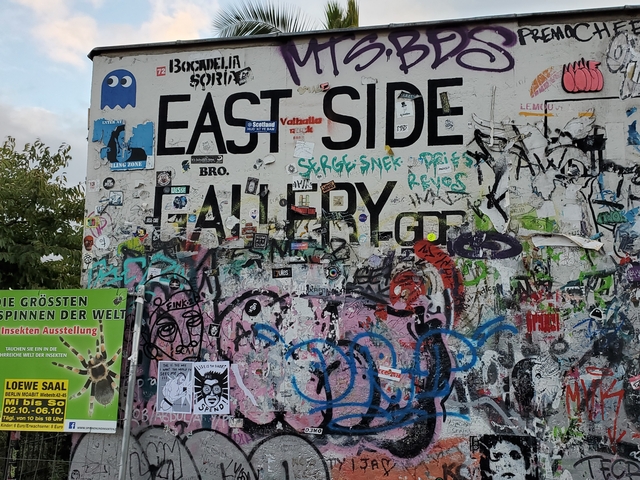       Graffiti on the Berlin Wall at East Side Gallery.
  
