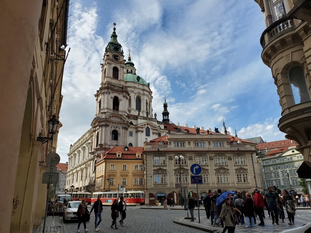 Street view of St. Nicholas Church in Prague.
