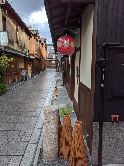 Quiet traditional Japanese alley with wooden buildings