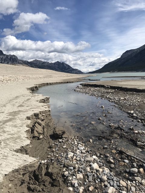 Meandering river through a rocky landscape.