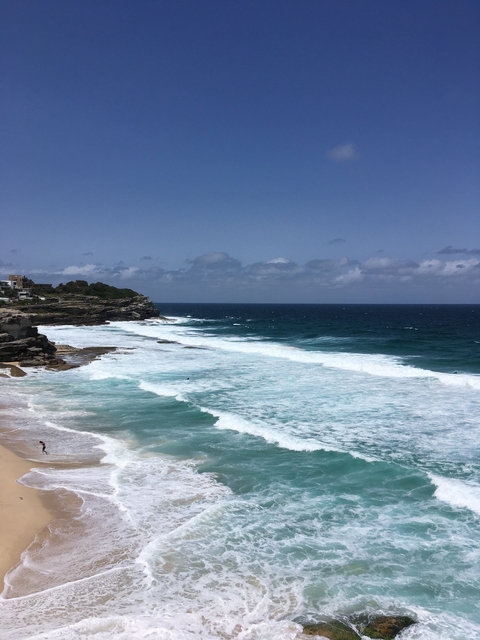 Waves crashing on a rocky coastline.