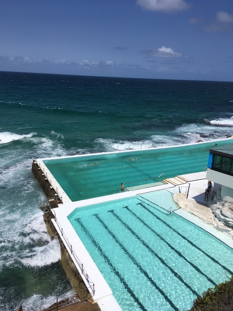 Outdoor swimming pools next to the ocean at Bondi Beach.