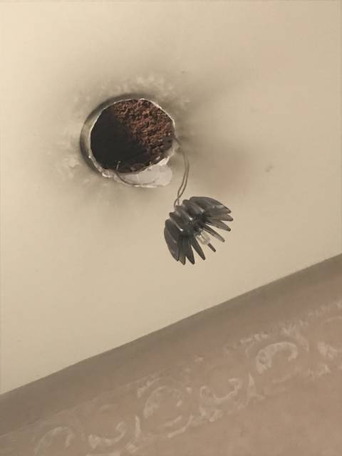      Damaged ceiling light fixture.
  