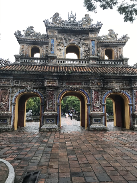 Ancient gate with detailed carvings and architecture.