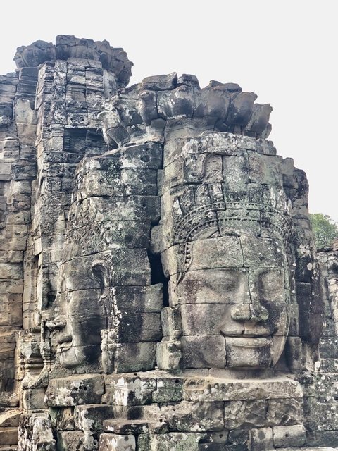       Ancient carved stone temple with intricate details.
  