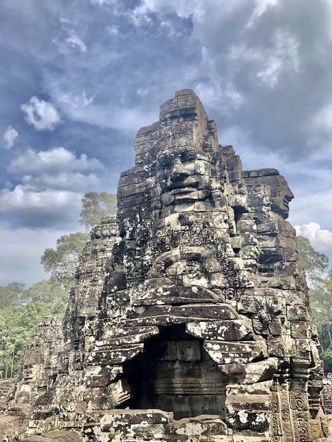       Ancient stone temple with intricate carvings.
  
