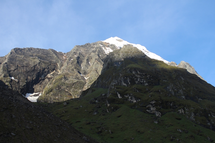 Mountain peak covered in snow.
