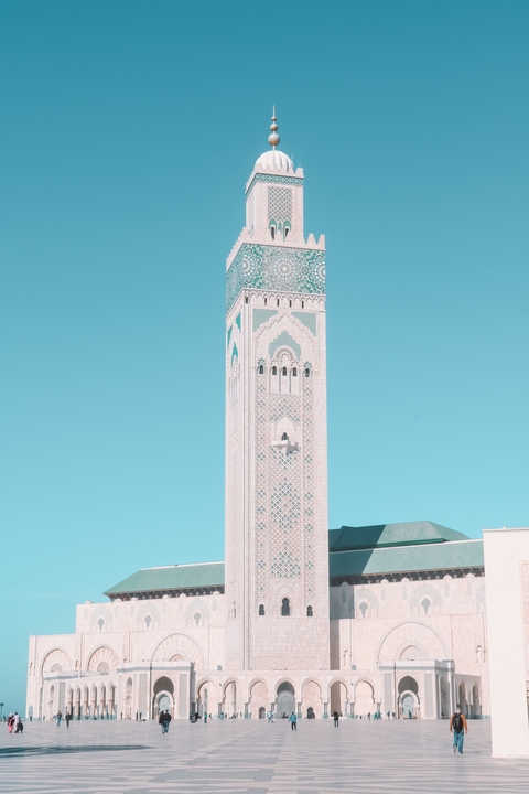Hassan II Mosque in Casablanca with clear blue sky.