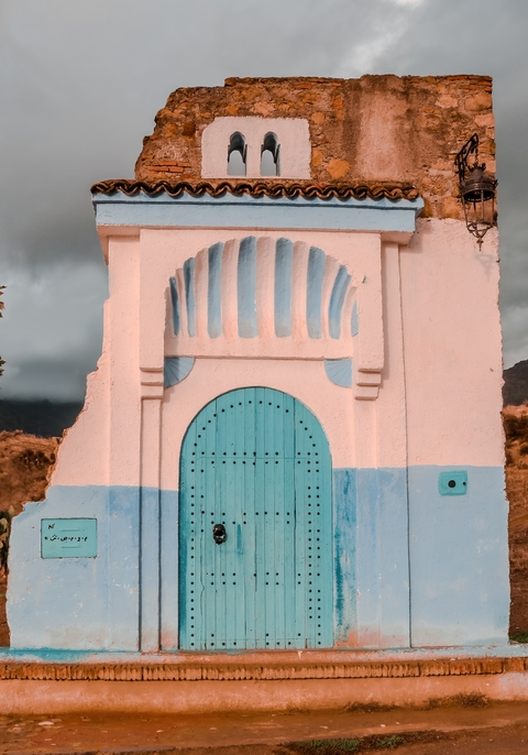 Traditional Moroccan doorway with blue and white colors.
