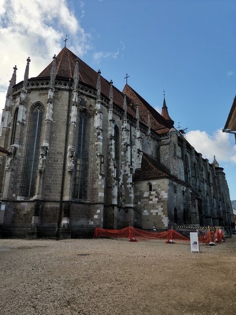       Large church with intricate architectural details.
  