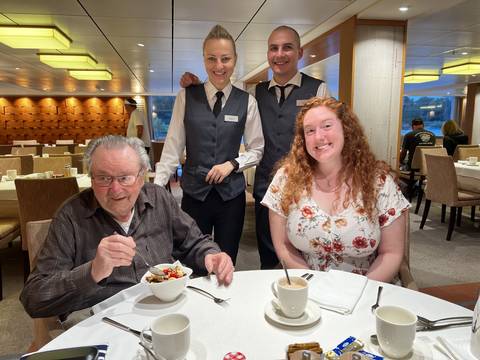A group of people dining together in a restaurant.