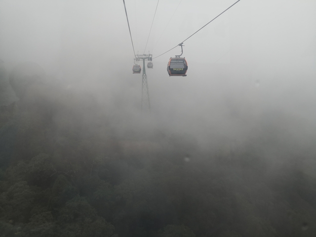       Cable cars in foggy weather.
  