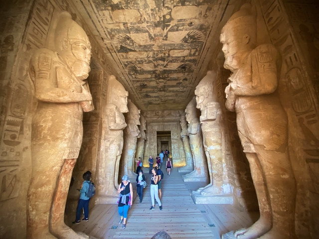 Tourists exploring an ancient Egyptian temple.