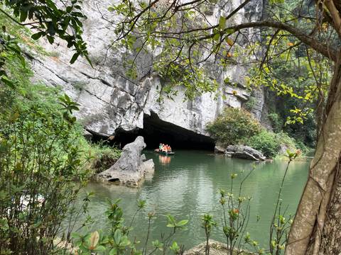       Picturesque view of a river with rocky outcrops.
  