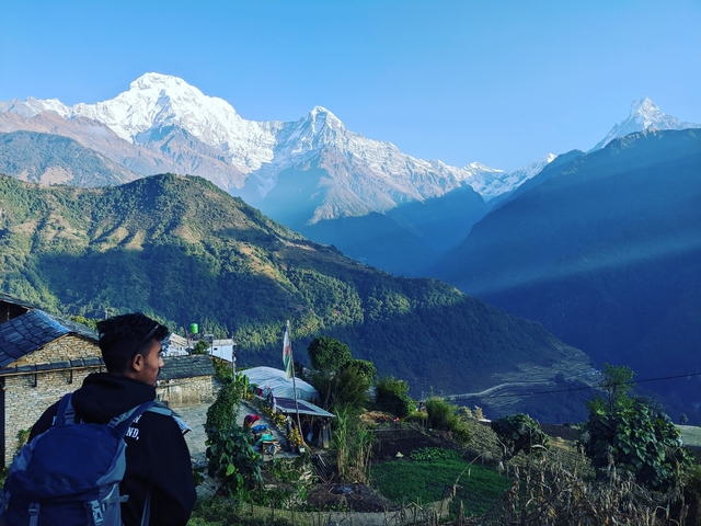       Person looking at mountains, Annapurna range.
  