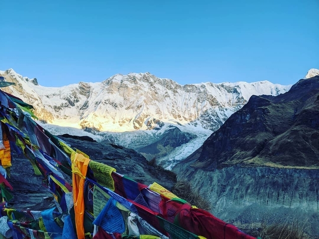 Mountain range with prayer flags.