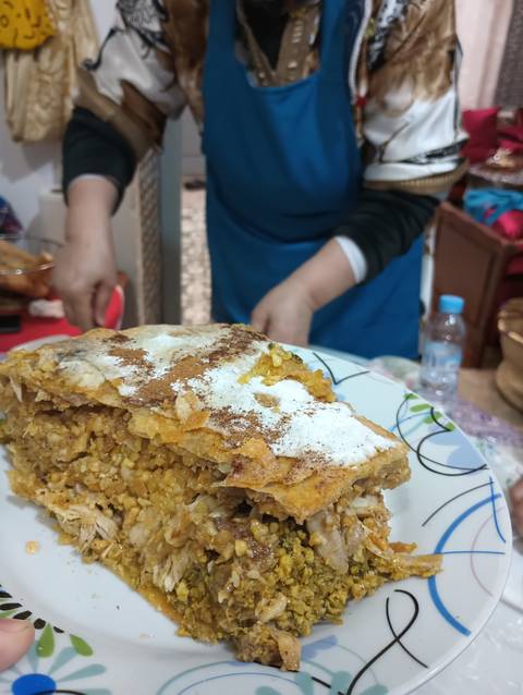       A traditional dish served on a large plate.
  