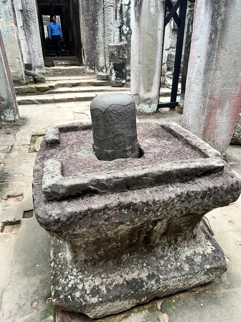 Stone pedestal or structure part with engraving.