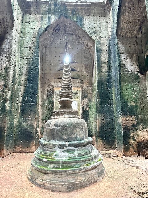       Interior of an ancient temple with natural light.
  